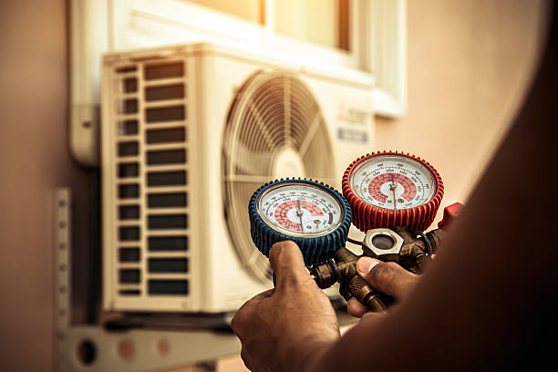 Professional Hvac technician working in Santa Fe, TN